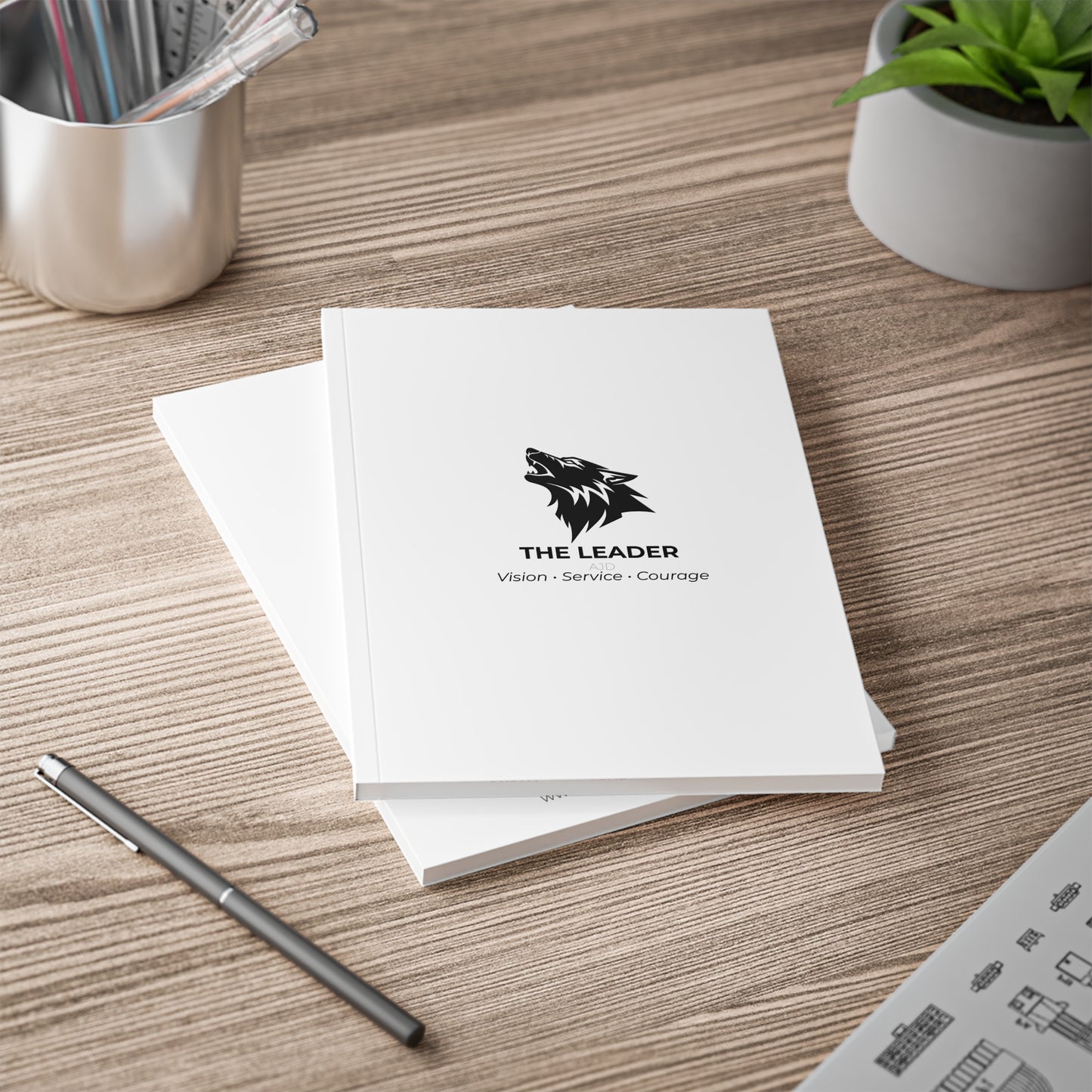The Leader Softcover Notebook